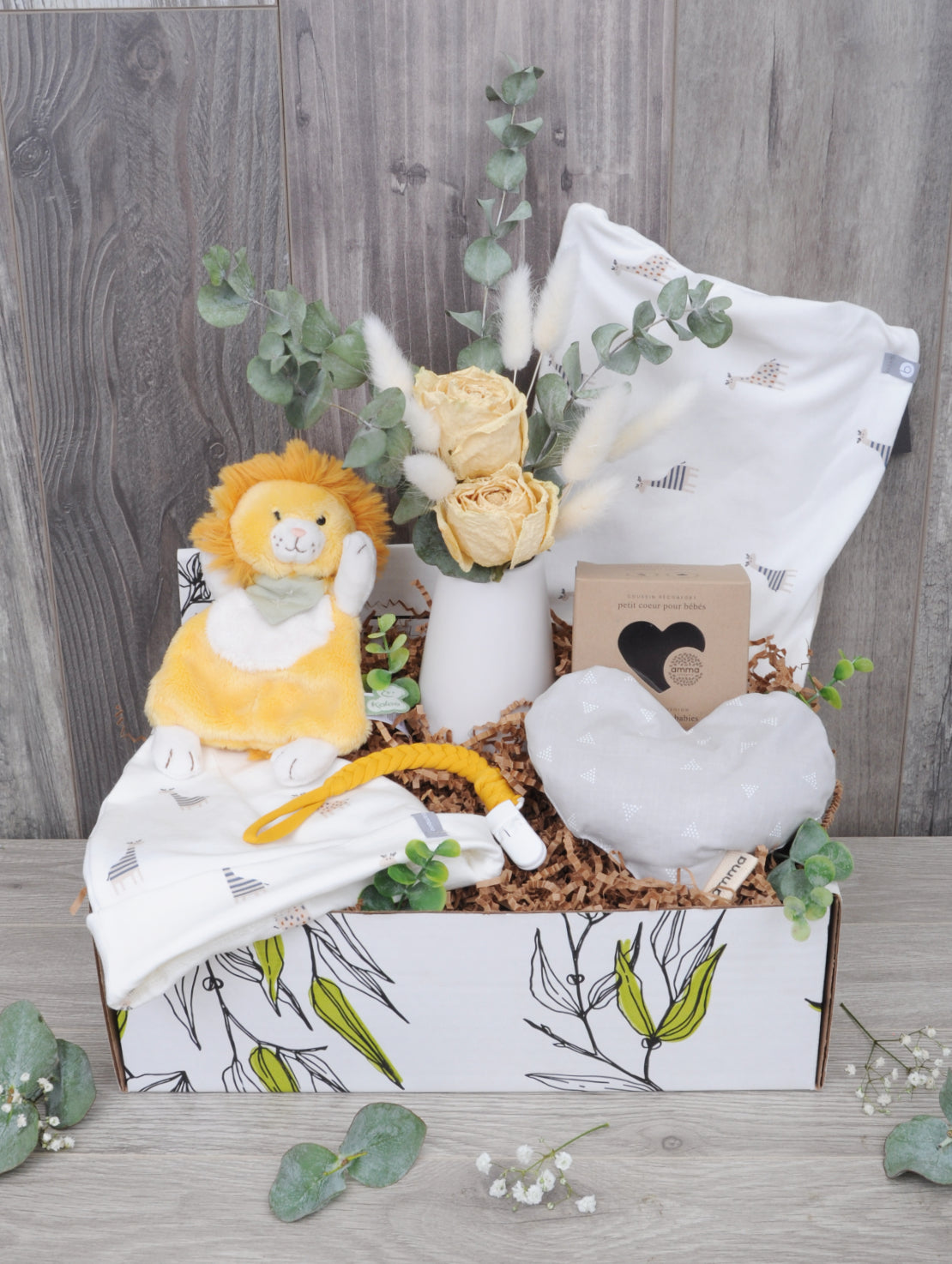Soins pour bébé, fleurs et réconfort